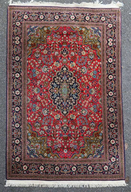 An Isfahan rug, 6ft 11in by 4ft 7in.